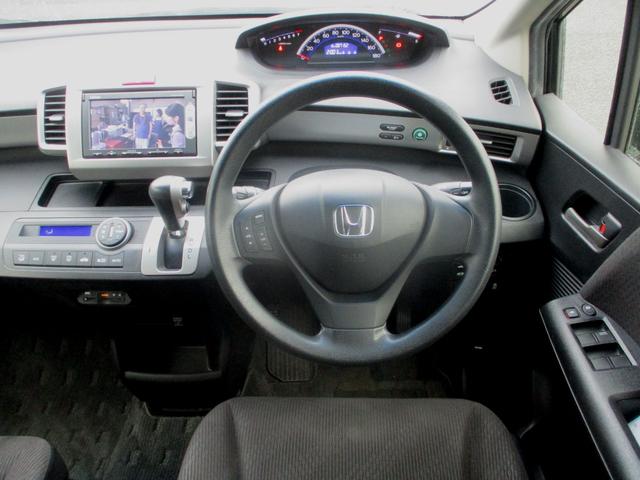 フリード G ジャストセレクション 1.5Gジャストセレクション.ナビTV.バックカメラ.ETC.両側パワースライドドア.HIDライト.社外アルミホイール.ワンオーナー.車検8年6月(3枚目)