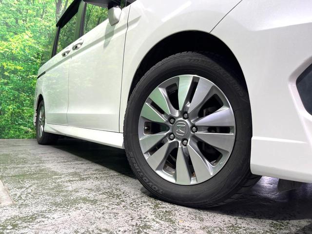 ステップワゴンスパーダ パワーエディション 両側電動ドア 純正SDナビ バックカメラ HIDヘッド ビルトインETC 純正16インチアルミ オートライト デュアルエアコン CD DVD再生 フルセグ パドルシフト(12枚目)