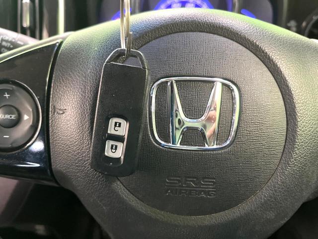 N-ONE プレミアム ツアラー・Lパッケージ ターボ SDナビ スマートキー HIDヘッド クルコン 純正15インチアルミ オートライト オートエアコン Bluetooth CD DVD再生 パドルシフト(5枚目)