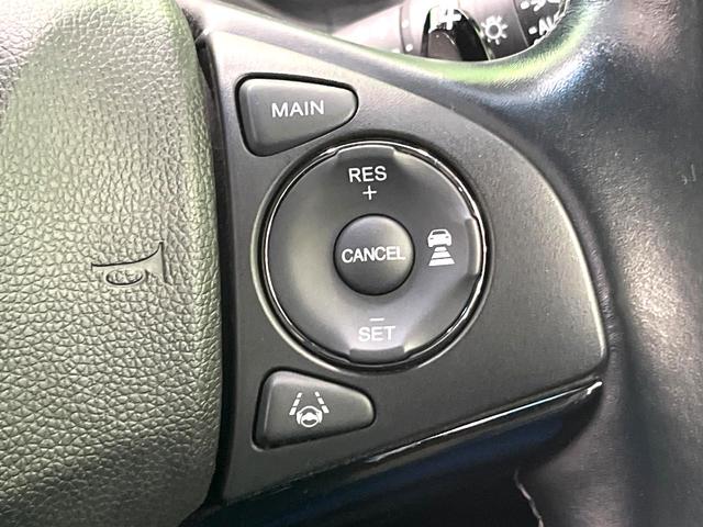 ヴェゼル ハイブリッドRS・ホンダセンシング 純正SDナビ バックカメラ 衝突被害軽減システム レーダークルーズ ハーフレザーシート コーナーセンサー スマートキー LEDヘッド ビルトインETC 純正18インチアルミ 車線逸脱警報(6枚目)