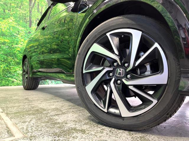 ヴェゼル ハイブリッドRS・ホンダセンシング 純正SDナビ バックカメラ 衝突被害軽減システム レーダークルーズ ハーフレザーシート コーナーセンサー スマートキー LEDヘッド ビルトインETC 純正18インチアルミ 車線逸脱警報(12枚目)