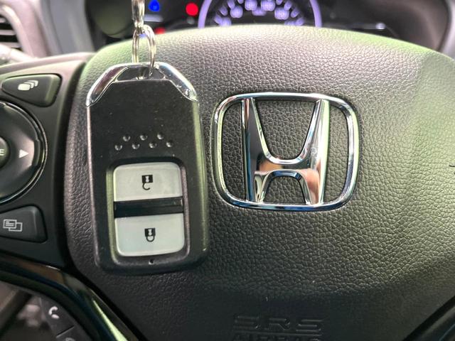 ヴェゼル ハイブリッドRS・ホンダセンシング 純正SDナビ バックカメラ 衝突被害軽減システム レーダークルーズ ハーフレザーシート コーナーセンサー スマートキー LEDヘッド ビルトインETC 純正18インチアルミ 車線逸脱警報(24枚目)