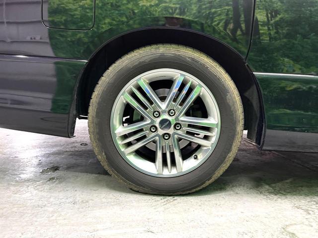 エルグランド ２５０ハイウェイスター　ブラックレザーＥＤ　電動スライドドア　純正ＤＶＤナビ　後席モニター　全周囲カメラ　パワーシート　コーナーセンサー　スマートキー　ＨＩＤヘッド　ビルトインＥＴＣ　１７インチアルミ　オートライト　デュアルエアコン　ＣＤ（48枚目）