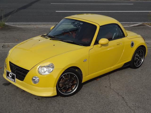 コペン ２ｎｄアニバーサリーエディション　５速ＭＴ　電動オープン動作確認済　エアロ　ＲＡＹＳアルミ　Ｄ－ＳＰＯＲＴマフラー　ＢＬＩＴＺ車高調　ＲＥＣＡＲＯ　シートヒーター　ＭＯＭＯステアリング　社外ナビ　バックカメラ　ＴＶ　Ｂｌｕｅｔｏｏｔｈ（11枚目）