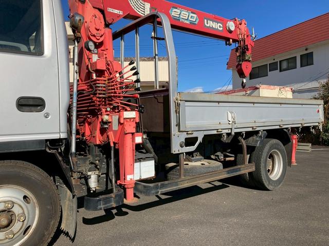 エルフトラック ５段クレーン　セミワイドロング　スムーサー　リヤアウトリガー　５段クレーンセミワイドロング古河ユニック２．９３ｔ吊スムーサーリヤアウトリガーあおり開閉補助装置ＥＴＣ　ＰＳ　ＰＷ　電格ミラーエアバック燃焼装置小型トラックユニック車差し違えアウトリガーシルバー色（38枚目）