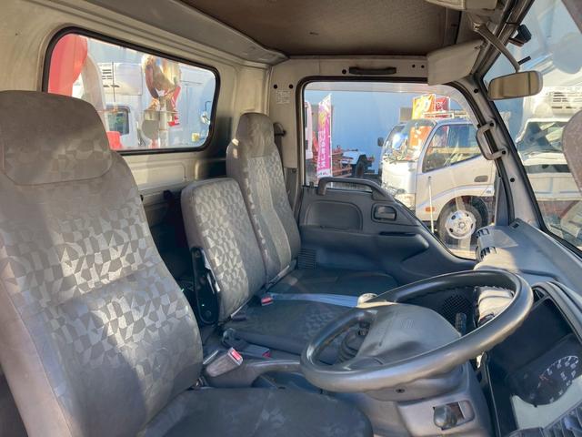 エルフトラック ５段クレーン　セミワイドロング　スムーサー　リヤアウトリガー　５段クレーンセミワイドロング古河ユニック２．９３ｔ吊スムーサーリヤアウトリガーあおり開閉補助装置ＥＴＣ　ＰＳ　ＰＷ　電格ミラーエアバック燃焼装置小型トラックユニック車差し違えアウトリガーシルバー色（69枚目）