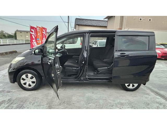 フリード Ｇ　ジャストセレクション　ＥＴＣ　バックカメラ　ナビ　ＴＶ　両側スライド・片側電動　スマートキー　電動格納ミラー　３列シート　ウォークスルー　ＣＶＴ　ＣＤ　ＤＶＤ再生　Ｂｌｕｅｔｏｏｔｈ　盗難防止システム　衝突安全ボディ（9枚目）