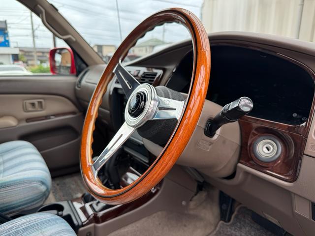 ハイラックスサーフ ＳＳＲ－Ｘ　ホワイトプレミアム　平成１４年車　全塗装済みレッド　リフトアップ　買取車　ナルディウッドハンドル　シートカバー　キーレス　フルセグ　ナビ　ＥＴＣ　記録簿（43枚目）