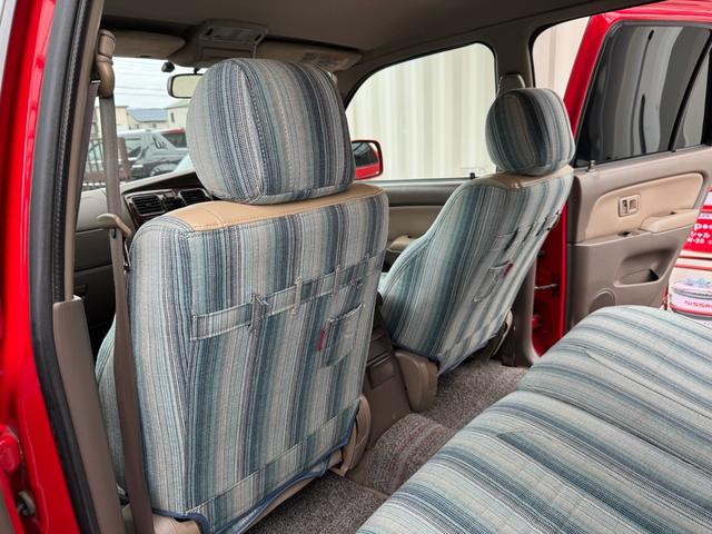 ハイラックスサーフ ＳＳＲ－Ｘ　ホワイトプレミアム　平成１４年車　全塗装済みレッド　リフトアップ　買取車　ナルディウッドハンドル　シートカバー　キーレス　フルセグ　ナビ　ＥＴＣ　記録簿（60枚目）