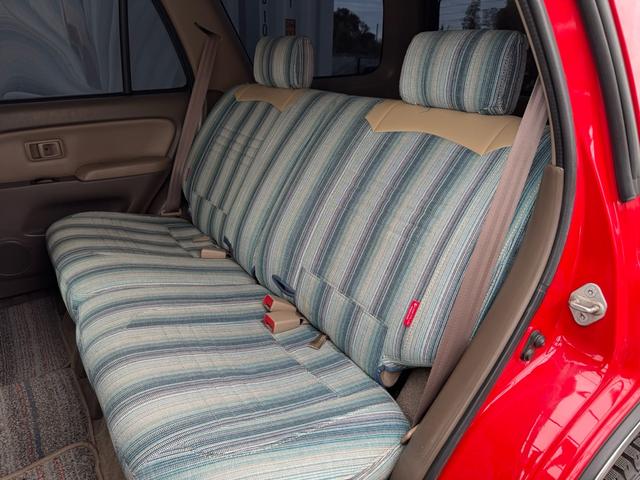 ハイラックスサーフ ＳＳＲ－Ｘ　ホワイトプレミアム　平成１４年車　全塗装済みレッド　リフトアップ　買取車　ナルディウッドハンドル　シートカバー　キーレス　フルセグ　ナビ　ＥＴＣ　記録簿（63枚目）