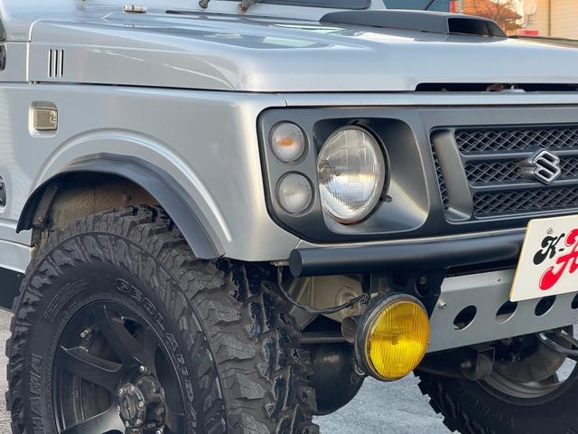 ジムニー ワイルドウインド リビルトエンジン載せ替え/2インチリフトアップ/社外バンパー/社外マフラー/タンクガード/社外16インチ/235/85/16/社外エアクリーナ/(4枚目)