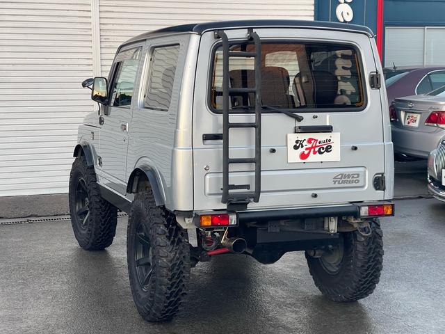 ジムニー ワイルドウインド リビルトエンジン載せ替え/2インチリフトアップ/社外バンパー/社外マフラー/タンクガード/社外16インチ/235/85/16/社外エアクリーナ/(6枚目)