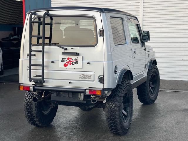 ジムニー ワイルドウインド リビルトエンジン載せ替え/2インチリフトアップ/社外バンパー/社外マフラー/タンクガード/社外16インチ/235/85/16/社外エアクリーナ/(8枚目)