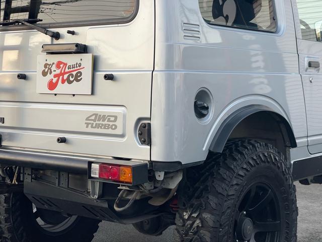 ジムニー ワイルドウインド リビルトエンジン載せ替え/2インチリフトアップ/社外バンパー/社外マフラー/タンクガード/社外16インチ/235/85/16/社外エアクリーナ/(10枚目)