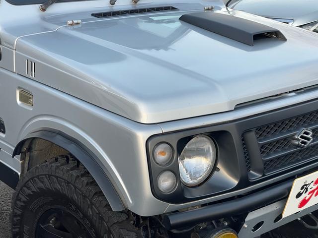 ジムニー ワイルドウインド リビルトエンジン載せ替え/2インチリフトアップ/社外バンパー/社外マフラー/タンクガード/社外16インチ/235/85/16/社外エアクリーナ/(11枚目)