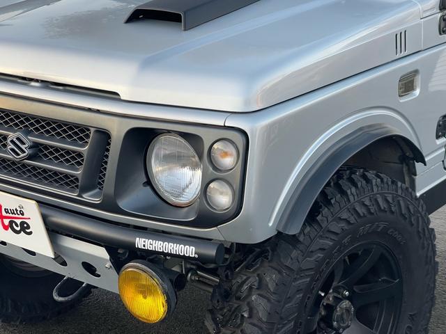 ジムニー ワイルドウインド リビルトエンジン載せ替え/2インチリフトアップ/社外バンパー/社外マフラー/タンクガード/社外16インチ/235/85/16/社外エアクリーナ/(12枚目)