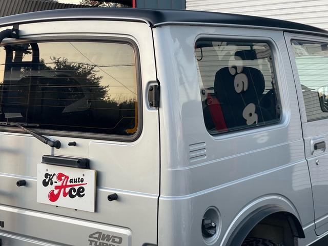 ジムニー ワイルドウインド リビルトエンジン載せ替え/2インチリフトアップ/社外バンパー/社外マフラー/タンクガード/社外16インチ/235/85/16/社外エアクリーナ/(14枚目)