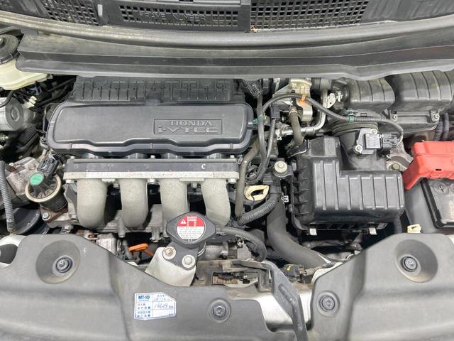 フリードスパイク ＧＬ　両側電動スライドドア　純正ナビ　バックカメラ　禁煙車　ＨＩＤヘッドライト　クルコン　スマートキー　オートエアコン　オートライト　１５インチＡＷ　Ｂｌｕｅｔｏｏｔｈ再生　フルセグ　ＤＶＤ／ＣＤ再生　ＳＤ（18枚目）