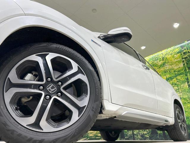 ヴェゼル ハイブリッドZ・ホンダセンシング 純正ナビ バックカメラ ホンダセンシング アダプティブクルーズ ハーフレザーシート シートヒーター レーンアシスト スマートキー LEDヘッド/フォグ オートマチックハイビーム オートブレーキホールド(13枚目)
