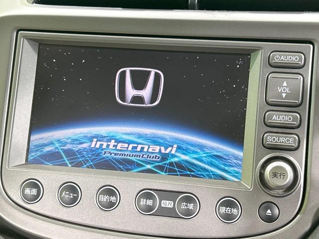 フィット X 純正ナビ バックカメラ クルーズコントロール 禁煙車 HIDヘッド ETC オートライト オートエアコン 純正15インチAW CD/DVD再生 地デジ ドアバイザー 電動格納ミラー 革巻きステアリング(3枚目)