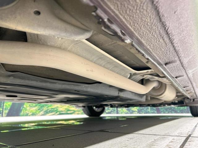 フィット X 純正ナビ バックカメラ クルーズコントロール 禁煙車 HIDヘッド ETC オートライト オートエアコン 純正15インチAW CD/DVD再生 地デジ ドアバイザー 電動格納ミラー 革巻きステアリング(21枚目)