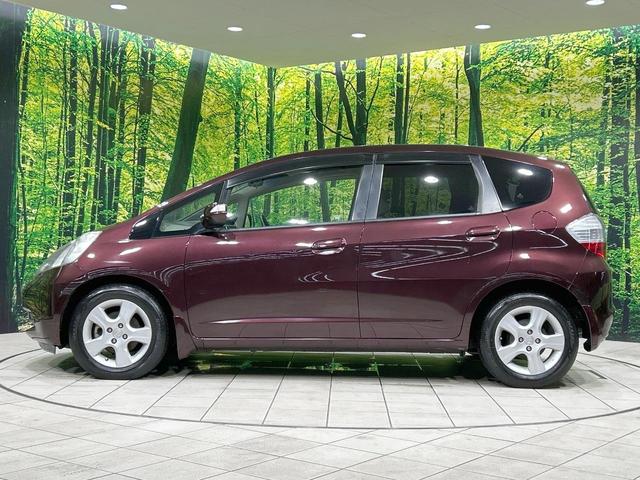 フィット X 純正ナビ バックカメラ クルーズコントロール 禁煙車 HIDヘッド ETC オートライト オートエアコン 純正15インチAW CD/DVD再生 地デジ ドアバイザー 電動格納ミラー 革巻きステアリング(25枚目)