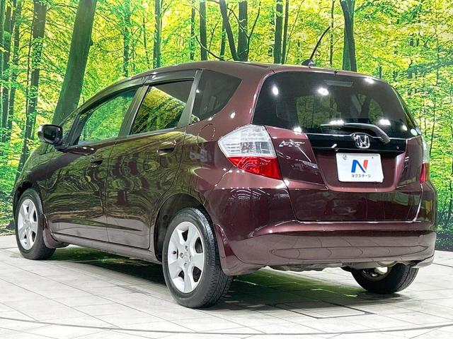 フィット X 純正ナビ バックカメラ クルーズコントロール 禁煙車 HIDヘッド ETC オートライト オートエアコン 純正15インチAW CD/DVD再生 地デジ ドアバイザー 電動格納ミラー 革巻きステアリング(26枚目)