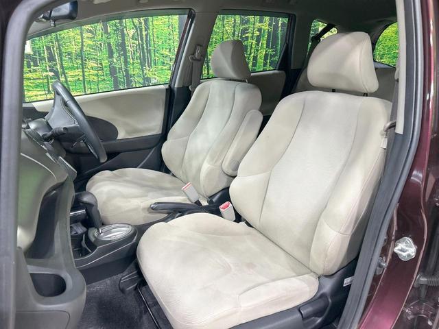 フィット X 純正ナビ バックカメラ クルーズコントロール 禁煙車 HIDヘッド ETC オートライト オートエアコン 純正15インチAW CD/DVD再生 地デジ ドアバイザー 電動格納ミラー 革巻きステアリング(32枚目)