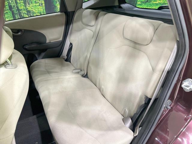 フィット X 純正ナビ バックカメラ クルーズコントロール 禁煙車 HIDヘッド ETC オートライト オートエアコン 純正15インチAW CD/DVD再生 地デジ ドアバイザー 電動格納ミラー 革巻きステアリング(33枚目)