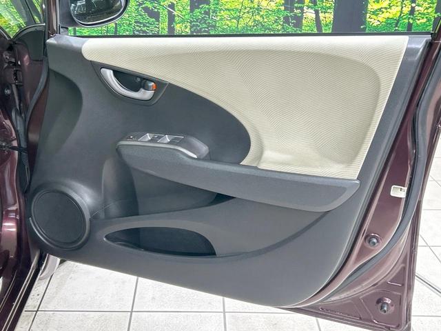 フィット X 純正ナビ バックカメラ クルーズコントロール 禁煙車 HIDヘッド ETC オートライト オートエアコン 純正15インチAW CD/DVD再生 地デジ ドアバイザー 電動格納ミラー 革巻きステアリング(38枚目)