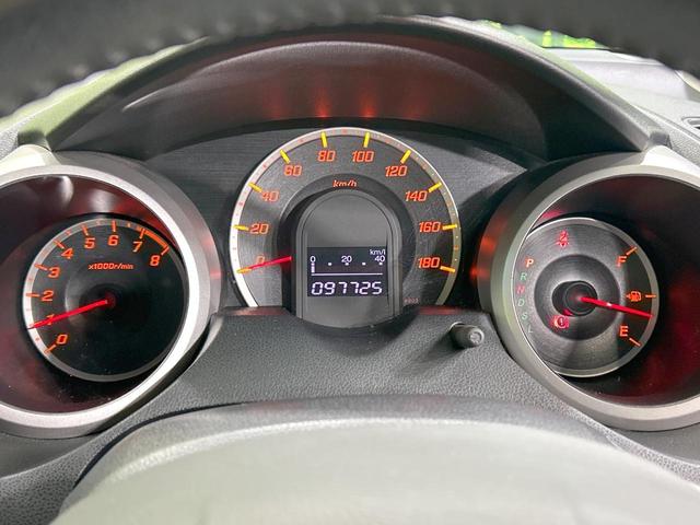 フィット X 純正ナビ バックカメラ クルーズコントロール 禁煙車 HIDヘッド ETC オートライト オートエアコン 純正15インチAW CD/DVD再生 地デジ ドアバイザー 電動格納ミラー 革巻きステアリング(42枚目)