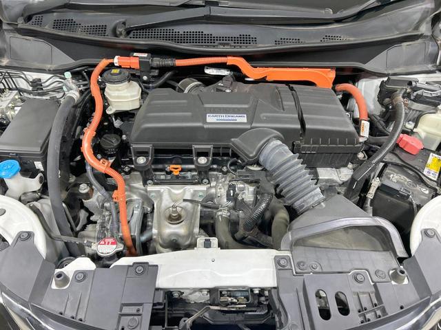 オデッセイハイブリッド ハイブリッドアブソルート・EXホンダセンシング 後席モニタ 純正9型ナビ 全周囲カメラ ホンダセンシング アダプティブクルーズ ブラインドスポットモニター 両側電動スライドドア クリアランスソナー 前席シートヒーター 前席パワーシート ETC2.0(18枚目)