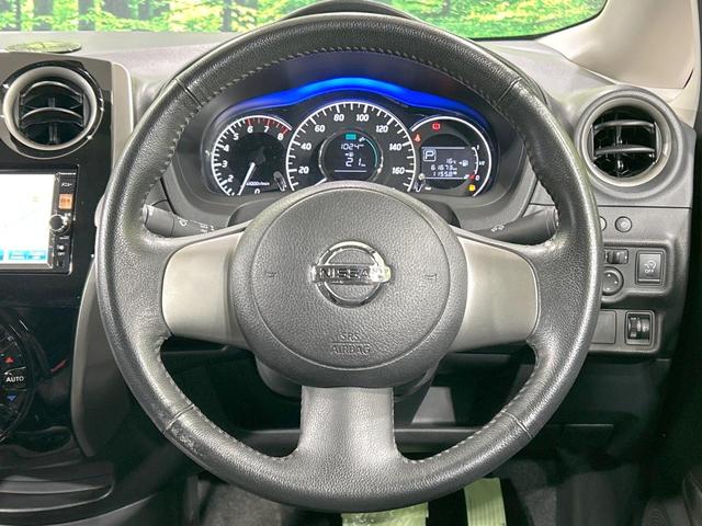 ノート メダリスト 純正ナビ 全周囲カメラ 禁煙車 Bluetooth接続 ETC ハーフレザーシート スマートキー オートライト オートエアコン CD/DVD再生 フルセグ 純正革巻きステアリング 電動格納ミラー(11枚目)