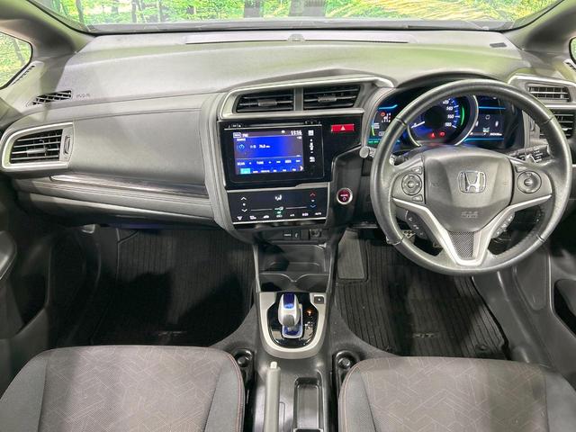 フィットハイブリッド Ｓパッケージ　純正ナビ　バックカメラ　シティブレーキ　クルーズコントロール　禁煙車　ＥＴＣ　Ｂｌｕｅｔｏｏｔｈ再生　ＬＥＤヘッド　オートライト　フロントフォグ　スマートキー　純正１５インチアルミ　オートエアコン（2枚目）