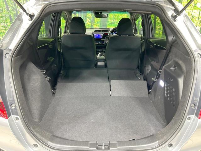 フィットハイブリッド Ｓパッケージ　純正ナビ　バックカメラ　シティブレーキ　クルーズコントロール　禁煙車　ＥＴＣ　Ｂｌｕｅｔｏｏｔｈ再生　ＬＥＤヘッド　オートライト　フロントフォグ　スマートキー　純正１５インチアルミ　オートエアコン（10枚目）