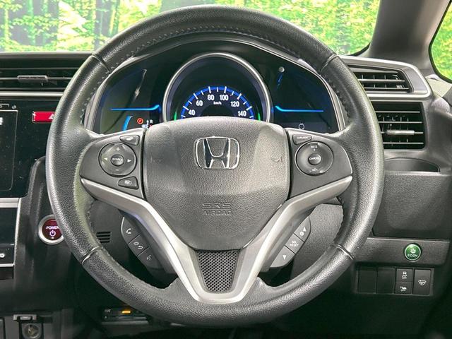 フィットハイブリッド Ｓパッケージ　純正ナビ　バックカメラ　シティブレーキ　クルーズコントロール　禁煙車　ＥＴＣ　Ｂｌｕｅｔｏｏｔｈ再生　ＬＥＤヘッド　オートライト　フロントフォグ　スマートキー　純正１５インチアルミ　オートエアコン（11枚目）