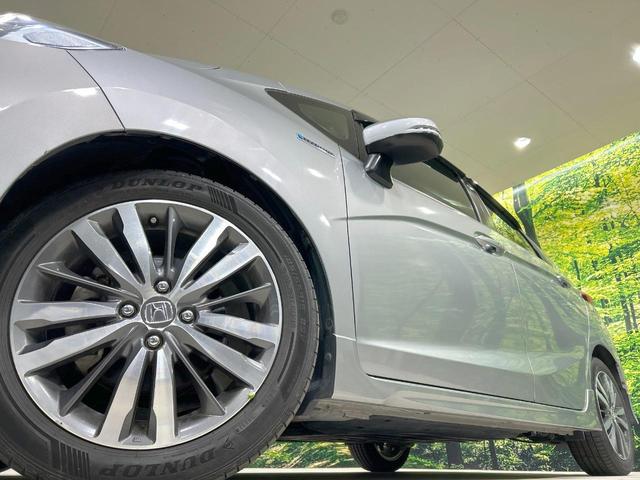 フィットハイブリッド Ｓパッケージ　純正ナビ　バックカメラ　シティブレーキ　クルーズコントロール　禁煙車　ＥＴＣ　Ｂｌｕｅｔｏｏｔｈ再生　ＬＥＤヘッド　オートライト　フロントフォグ　スマートキー　純正１５インチアルミ　オートエアコン（13枚目）