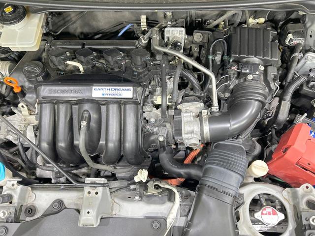 フィットハイブリッド Ｓパッケージ　純正ナビ　バックカメラ　シティブレーキ　クルーズコントロール　禁煙車　ＥＴＣ　Ｂｌｕｅｔｏｏｔｈ再生　ＬＥＤヘッド　オートライト　フロントフォグ　スマートキー　純正１５インチアルミ　オートエアコン（18枚目）