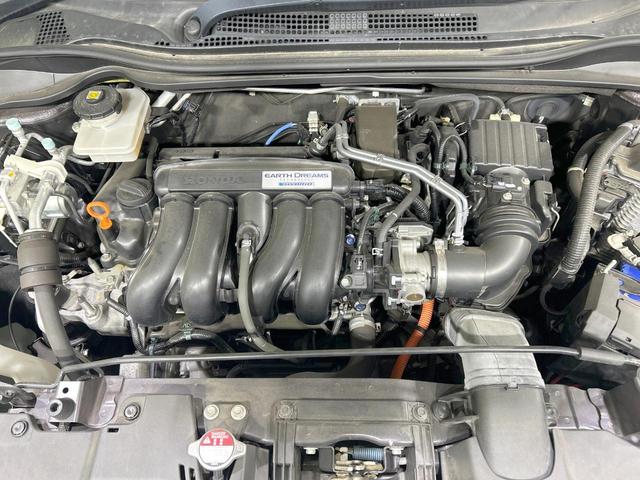 ヴェゼル ハイブリッドＺ・ホンダセンシング　純正９型ナビ　バックカメラ　レーダークルーズ　禁煙車　ＥＴＣ　Ｂｌｕｅｔｏｏｔｈ再生　シートヒーター　ハーフレザー　ＬＥＤヘッド＆フォグ　オートハイビーム　オートライト　デュアルエアコン　スマートキー（18枚目）