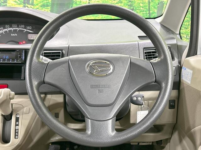 ムーヴ Ｌ　禁煙車　オートエアコン　１４インチアルミホイール　ｃａｒｒｏｚｚｅｒｉａ製オーディオ　ＣＤ再生　ヘッドライトレベライザー　リモコンキー　電動格納ミラー　インパネシフト　ドアバイザー　プライバシーガラス（11枚目）