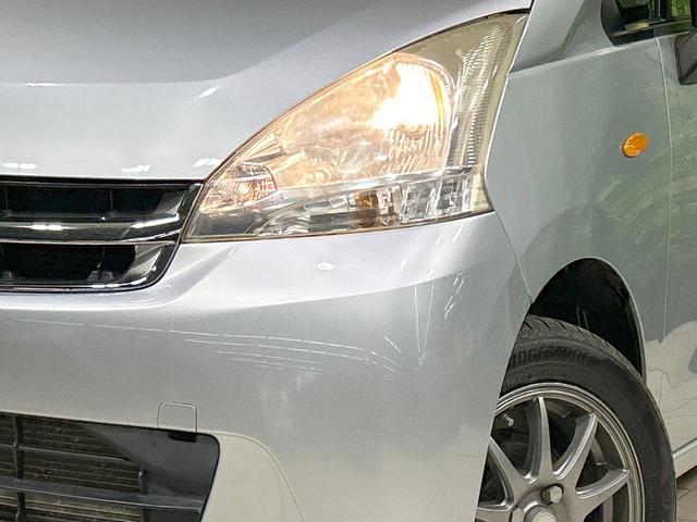 ムーヴ Ｌ　禁煙車　オートエアコン　１４インチアルミホイール　ｃａｒｒｏｚｚｅｒｉａ製オーディオ　ＣＤ再生　ヘッドライトレベライザー　リモコンキー　電動格納ミラー　インパネシフト　ドアバイザー　プライバシーガラス（12枚目）