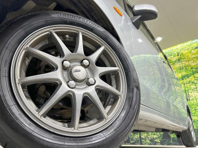 ムーヴ Ｌ　禁煙車　オートエアコン　１４インチアルミホイール　ｃａｒｒｏｚｚｅｒｉａ製オーディオ　ＣＤ再生　ヘッドライトレベライザー　リモコンキー　電動格納ミラー　インパネシフト　ドアバイザー　プライバシーガラス（13枚目）