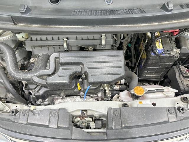 ムーヴ Ｌ　禁煙車　オートエアコン　１４インチアルミホイール　ｃａｒｒｏｚｚｅｒｉａ製オーディオ　ＣＤ再生　ヘッドライトレベライザー　リモコンキー　電動格納ミラー　インパネシフト　ドアバイザー　プライバシーガラス（18枚目）