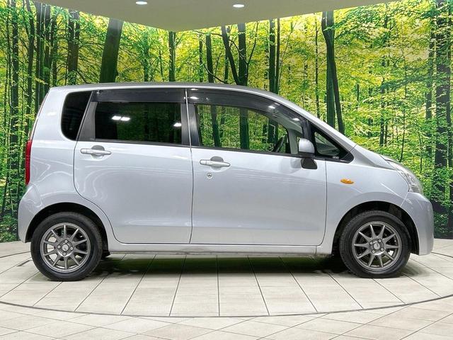 ムーヴ Ｌ　禁煙車　オートエアコン　１４インチアルミホイール　ｃａｒｒｏｚｚｅｒｉａ製オーディオ　ＣＤ再生　ヘッドライトレベライザー　リモコンキー　電動格納ミラー　インパネシフト　ドアバイザー　プライバシーガラス（25枚目）