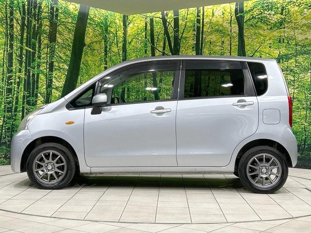 ムーヴ Ｌ　禁煙車　オートエアコン　１４インチアルミホイール　ｃａｒｒｏｚｚｅｒｉａ製オーディオ　ＣＤ再生　ヘッドライトレベライザー　リモコンキー　電動格納ミラー　インパネシフト　ドアバイザー　プライバシーガラス（27枚目）