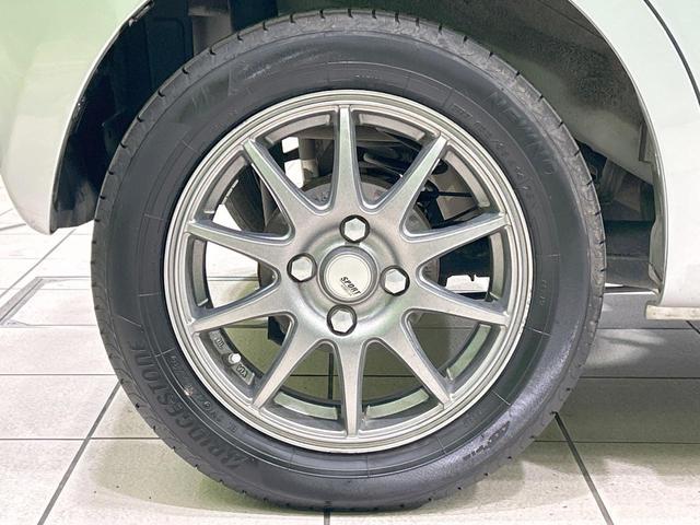 ムーヴ Ｌ　禁煙車　オートエアコン　１４インチアルミホイール　ｃａｒｒｏｚｚｅｒｉａ製オーディオ　ＣＤ再生　ヘッドライトレベライザー　リモコンキー　電動格納ミラー　インパネシフト　ドアバイザー　プライバシーガラス（28枚目）