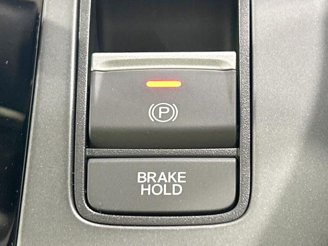 フリード クロスター 登録済未使用車 両側電動スライドドア ホンダセンシング ハーフレザーシート ブラインドスポットモニター レーンキープ スマートキー LEDヘッド ルーフレール 純正15インチAW オートハイビーム(7枚目)
