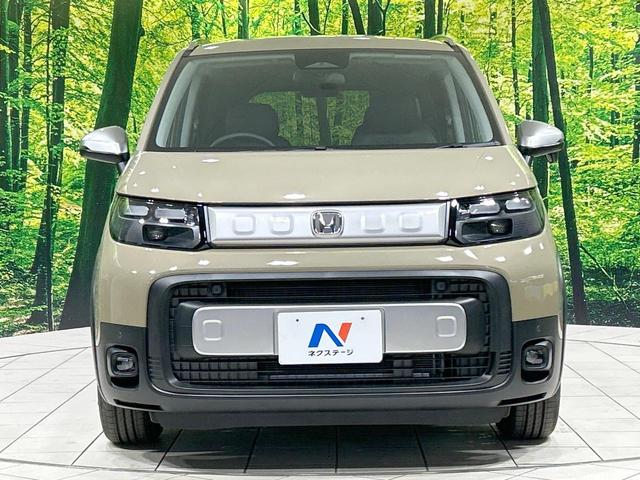 フリード クロスター 登録済未使用車 両側電動スライドドア ホンダセンシング ハーフレザーシート ブラインドスポットモニター レーンキープ スマートキー LEDヘッド ルーフレール 純正15インチAW オートハイビーム(14枚目)