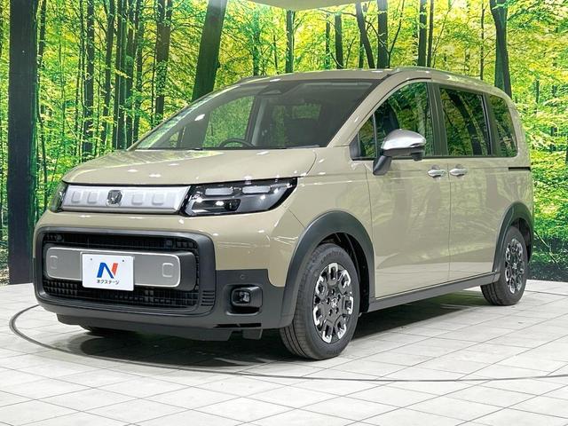 フリード クロスター 登録済未使用車 両側電動スライドドア ホンダセンシング ハーフレザーシート ブラインドスポットモニター レーンキープ スマートキー LEDヘッド ルーフレール 純正15インチAW オートハイビーム(23枚目)