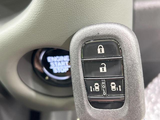フリード クロスター 登録済未使用車 両側電動スライドドア ホンダセンシング ハーフレザーシート ブラインドスポットモニター レーンキープ スマートキー LEDヘッド ルーフレール 純正15インチAW オートハイビーム(30枚目)